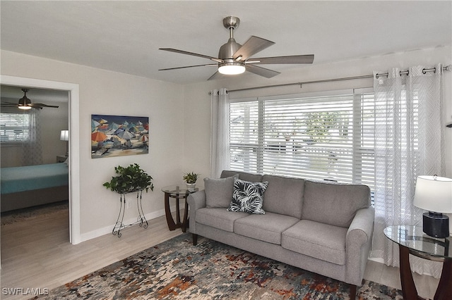 1721 Cascade Way N, Fort Myers, FL 33917 - living room featuring a ceiling fan and wood finished floors