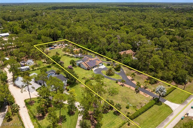 6011 Sea Grass Ln, Naples, FL 34116 - aerial view of property and surrounding area with a forest and property boundaries highlighted