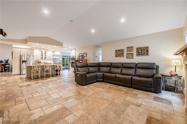 6011 Sea Grass Ln, Naples, FL 34116 - living room featuring stone tile floors, vaulted ceiling, and recessed lighting