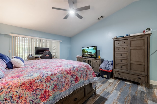6011 Sea Grass Ln, Naples, FL 34116 - bedroom featuring lofted ceiling, wood finished floors, and a ceiling fan