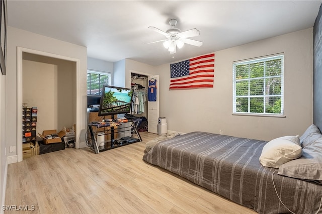 6011 Sea Grass Ln, Naples, FL 34116 - bedroom featuring wood finished floors, ceiling fan, and a closet