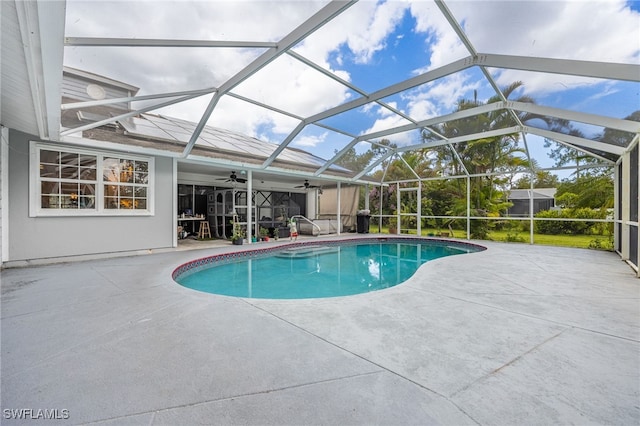 6011 Sea Grass Ln, Naples, FL 34116 - outdoor pool with a patio area, a ceiling fan, and a lanai