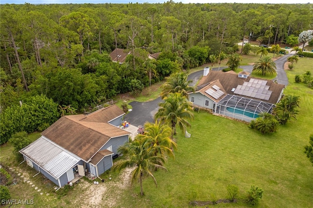 6011 Sea Grass Ln, Naples, FL 34116 - view from above of property featuring a heavily wooded area