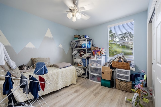 6011 Sea Grass Ln, Naples, FL 34116 - bedroom featuring wood finished floors and a ceiling fan