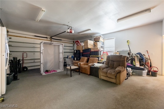 6011 Sea Grass Ln, Naples, FL 34116 - garage featuring a garage door opener