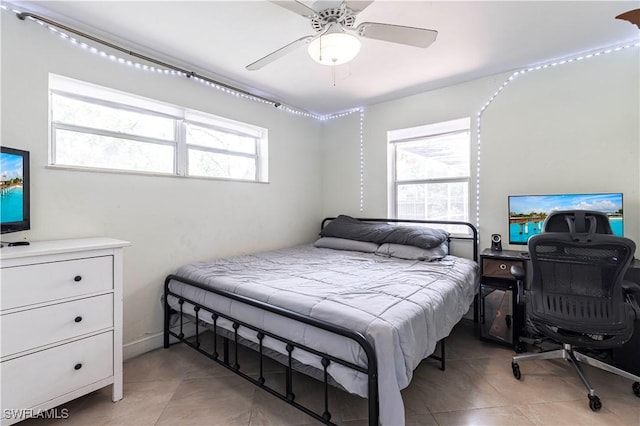 2401 Parkway St, Fort Myers, FL 33901 - bedroom with light tile patterned floors and ceiling fan