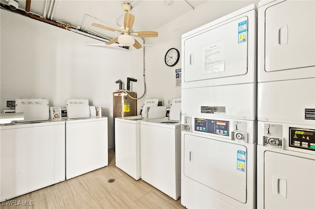 7360 Estero Blvd Unit Ph5, Fort Myers Beach, FL 33931 - shared laundry featuring stacked washer and clothes dryer, washer and dryer, ceiling fan, and electric water heater