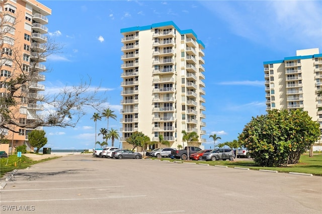 7360 Estero Blvd Unit Ph5, Fort Myers Beach, FL 33931 - view of apartment building / complex featuring uncovered parking