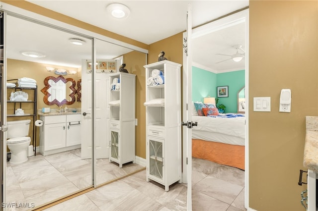 7360 Estero Blvd Unit Ph5, Fort Myers Beach, FL 33931 - ensuite bathroom featuring vanity, a ceiling fan, and ornamental molding
