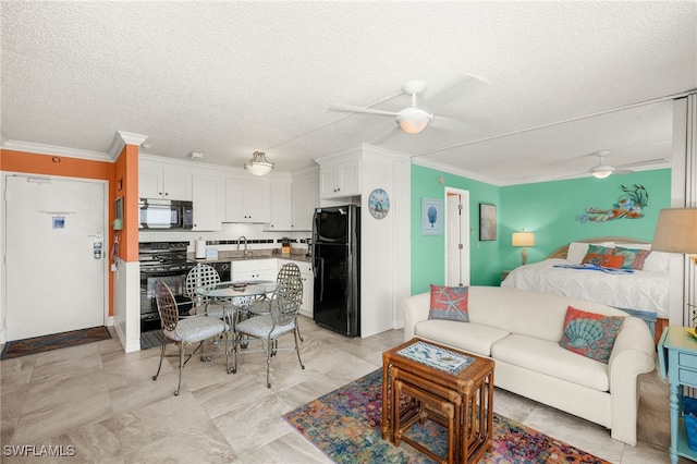 7360 Estero Blvd Unit Ph5, Fort Myers Beach, FL 33931 - living room featuring ceiling fan, crown molding, and a textured ceiling