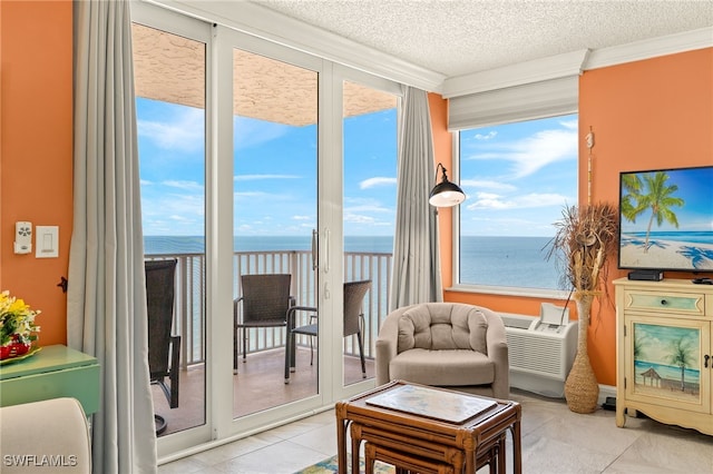 7360 Estero Blvd Unit Ph5, Fort Myers Beach, FL 33931 - living area with light tile patterned floors, a textured ceiling, and ornamental molding
