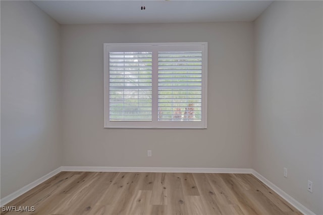 1964 Parson St, Naples, FL 34120 - spare room featuring light wood-style flooring
