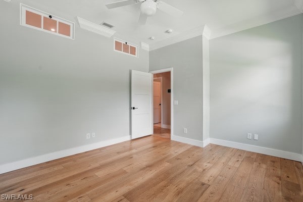 4740 5th Ave SW, Naples, FL 34119 - empty room featuring crown molding, ceiling fan, light wood-style flooring, and a high ceiling