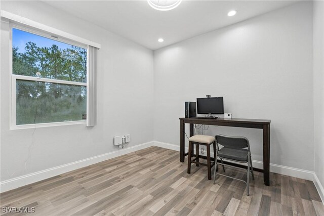 311 Long Ave S, Lehigh Acres, FL 33974 - office area with wood finished floors and recessed lighting