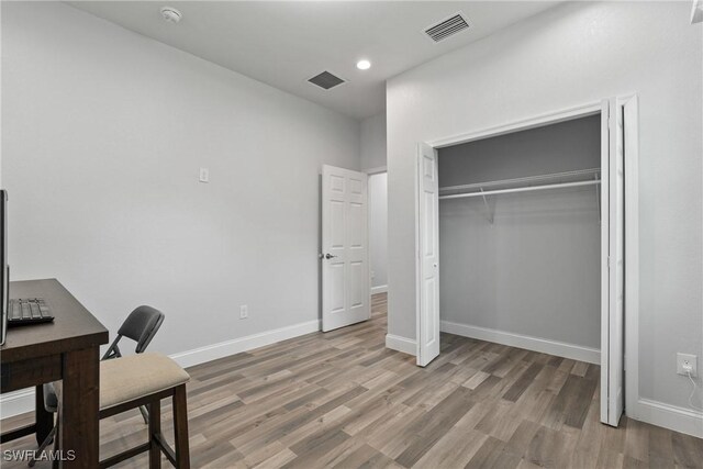 311 Long Ave S, Lehigh Acres, FL 33974 - office area featuring wood finished floors and recessed lighting