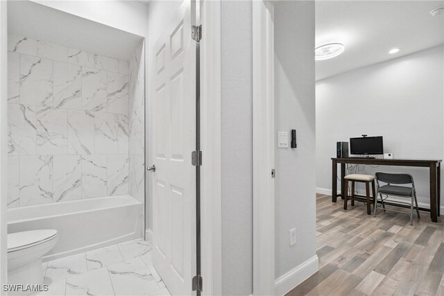 311 Long Ave S, Lehigh Acres, FL 33974 - bathroom with bathtub / shower combination and marble finish floors