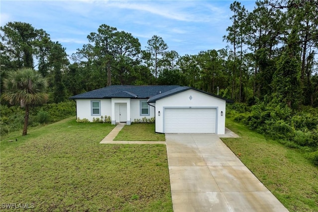 311 Long Ave S, Lehigh Acres, FL 33974 - ranch-style home with driveway, an attached garage, stucco siding, and a front yard