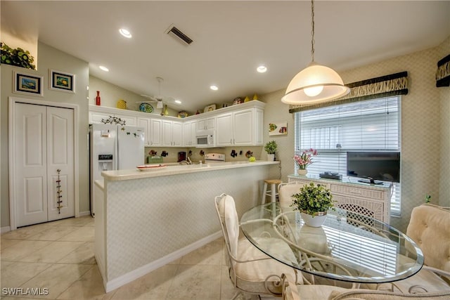 17791 Pineapple Palm Ct, North Fort Myers, FL 33917 - dining room featuring wallpapered walls, recessed lighting, and light tile patterned flooring