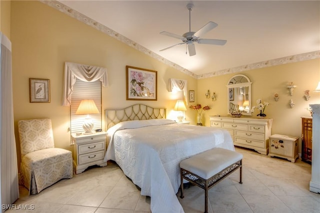 17791 Pineapple Palm Ct, North Fort Myers, FL 33917 - bedroom featuring lofted ceiling, light tile patterned flooring, and a ceiling fan