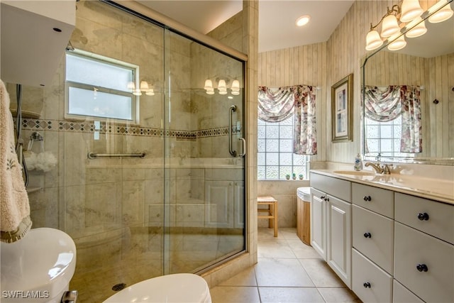 17791 Pineapple Palm Ct, North Fort Myers, FL 33917 - full bathroom with vanity, a shower stall, and tile patterned floors