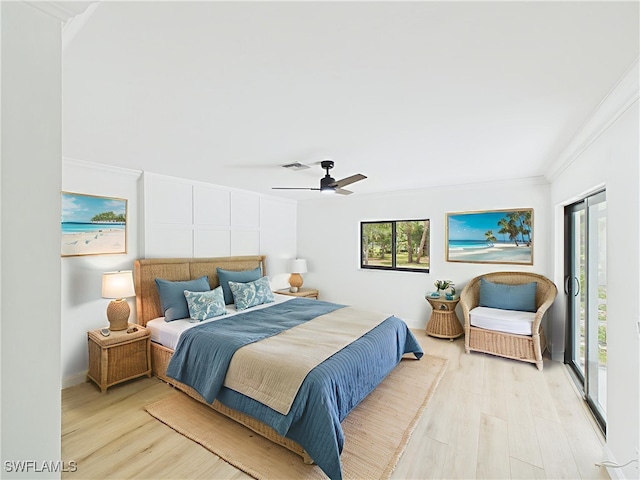 490 25th St SW, Naples, FL 34117 - bedroom featuring wood finished floors, crown molding, and a ceiling fan