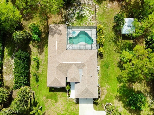 490 25th St SW, Naples, FL 34117 - view of subject property featuring a pool area