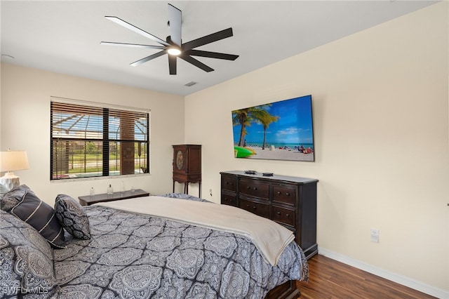 12905 Pastures Way, Fort Myers, FL 33913 - bedroom featuring dark wood-style flooring and ceiling fan