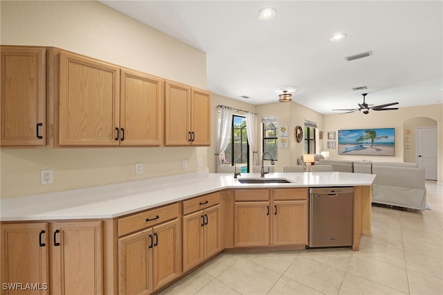 12905 Pastures Way, Fort Myers, FL 33913 - kitchen with stainless steel dishwasher, a peninsula, open floor plan, a ceiling fan, and light tile patterned floors