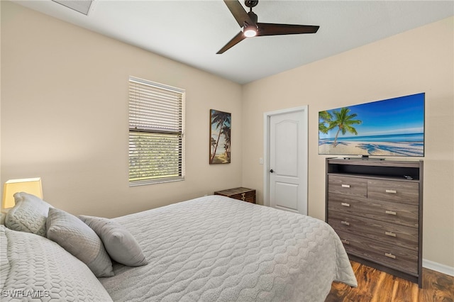 12905 Pastures Way, Fort Myers, FL 33913 - bedroom with dark wood-type flooring and ceiling fan