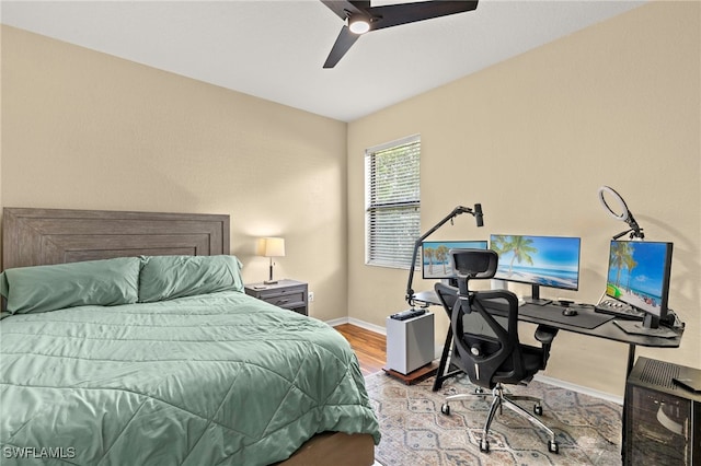 12905 Pastures Way, Fort Myers, FL 33913 - bedroom with wood finished floors, a desk, and ceiling fan