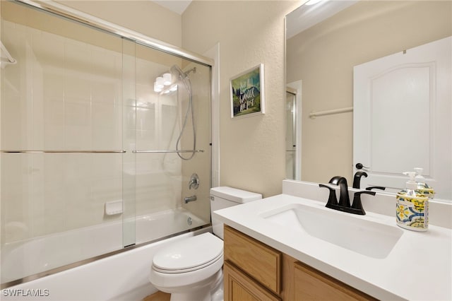 12905 Pastures Way, Fort Myers, FL 33913 - bathroom with vanity, shower / bath combination with glass door, and a textured wall