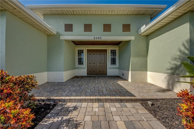 2102 SW 47th St, Cape Coral, FL 33914 - view of exterior entry with stucco siding