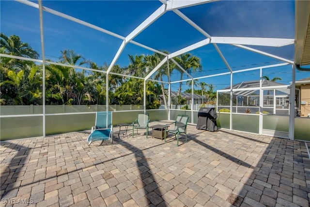 2102 SW 47th St, Cape Coral, FL 33914 - view of patio / terrace featuring area for grilling and glass enclosure