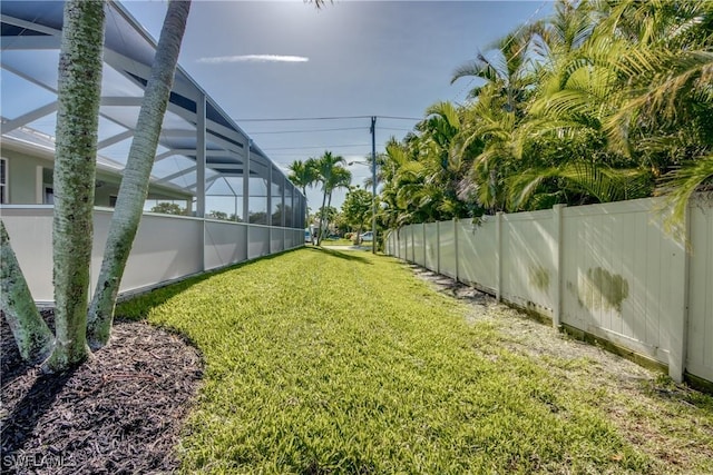 2102 SW 47th St, Cape Coral, FL 33914 - view of yard featuring glass enclosure