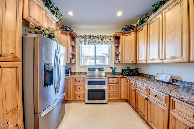 2102 SW 47th St, Cape Coral, FL 33914 - kitchen with stainless steel appliances, open shelves, stone counters, and recessed lighting