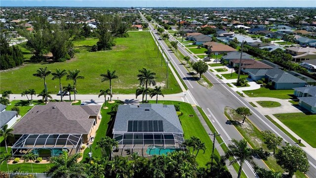 2102 SW 47th St, Cape Coral, FL 33914 - aerial view of residential area with a pool area