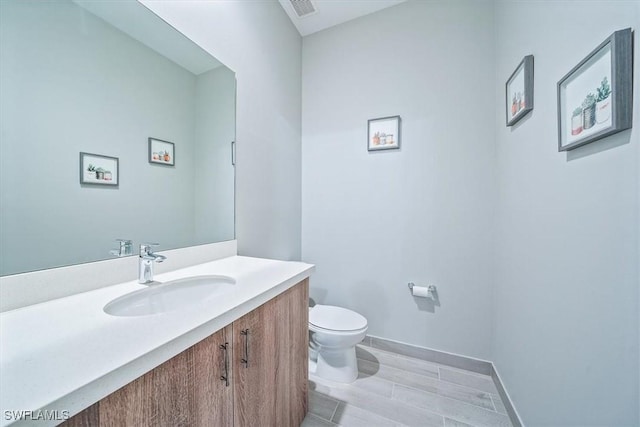 4955 Brigata Way, Ave Maria, FL 34142 - half bath with vanity and wood finished floors
