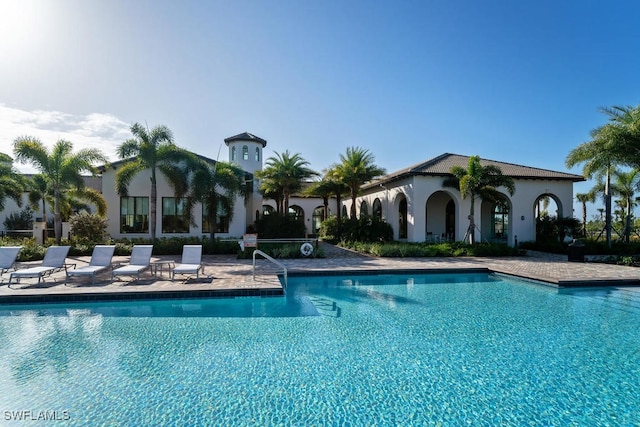 4955 Brigata Way, Ave Maria, FL 34142 - community pool featuring a patio