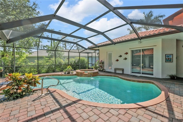 4000 Stonesthrow Ct, Naples, FL 34109 - view of swimming pool featuring a patio, a pool with connected hot tub, and a lanai
