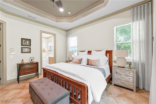 4000 Stonesthrow Ct, Naples, FL 34109 - bedroom with ornamental molding, multiple windows, a tray ceiling, ensuite bath, and light tile patterned floors