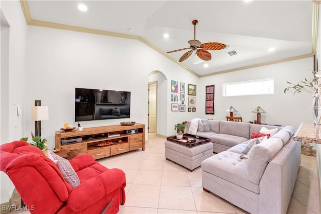 4000 Stonesthrow Ct, Naples, FL 34109 - living room with vaulted ceiling, arched walkways, ceiling fan, light tile patterned floors, and crown molding