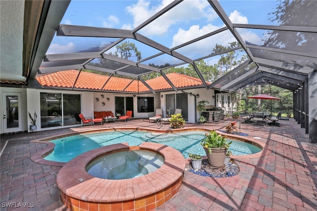 4000 Stonesthrow Ct, Naples, FL 34109 - view of pool with a patio, a pool with connected hot tub, outdoor dining area, and a lanai