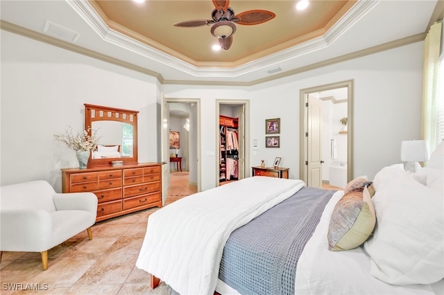 4000 Stonesthrow Ct, Naples, FL 34109 - bedroom with a raised ceiling, crown molding, a spacious closet, a closet, and ensuite bath