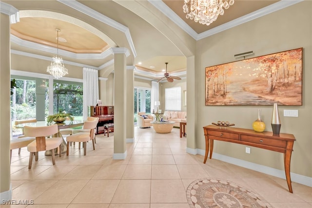 4000 Stonesthrow Ct, Naples, FL 34109 - foyer entrance with a raised ceiling, a chandelier, crown molding, healthy amount of natural light, and tile patterned flooring