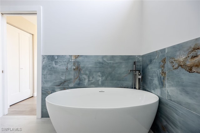 12730 Kelly Palm Dr, Fort Myers, FL 33908 - full bathroom with a freestanding tub and tile walls