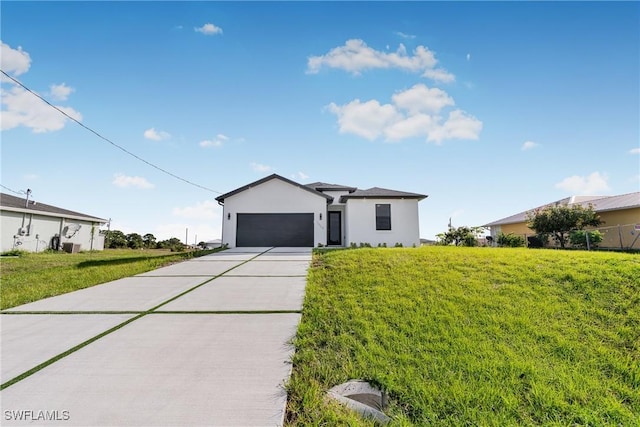 7029 Palpano Cir, Labelle, FL 33935 - ranch-style home with concrete driveway, an attached garage, stucco siding, and a front yard