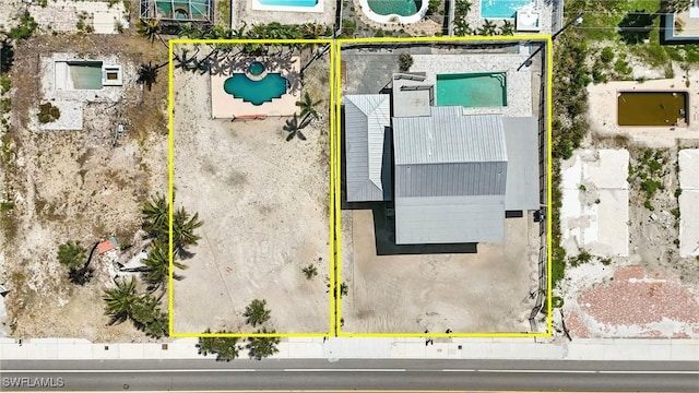 5557 Estero Blvd, Fort Myers Beach, FL 33931 - aerial view of property and surrounding area featuring property boundaries highlighted