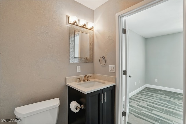 5557 Estero Blvd, Fort Myers Beach, FL 33931 - bathroom with vanity and wood finished floors