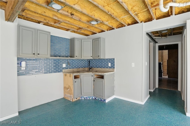 5557 Estero Blvd, Fort Myers Beach, FL 33931 - kitchen with backsplash and light countertops