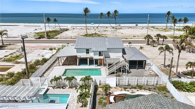 5557 Estero Blvd, Fort Myers Beach, FL 33931 - water view with a fenced backyard and local beach